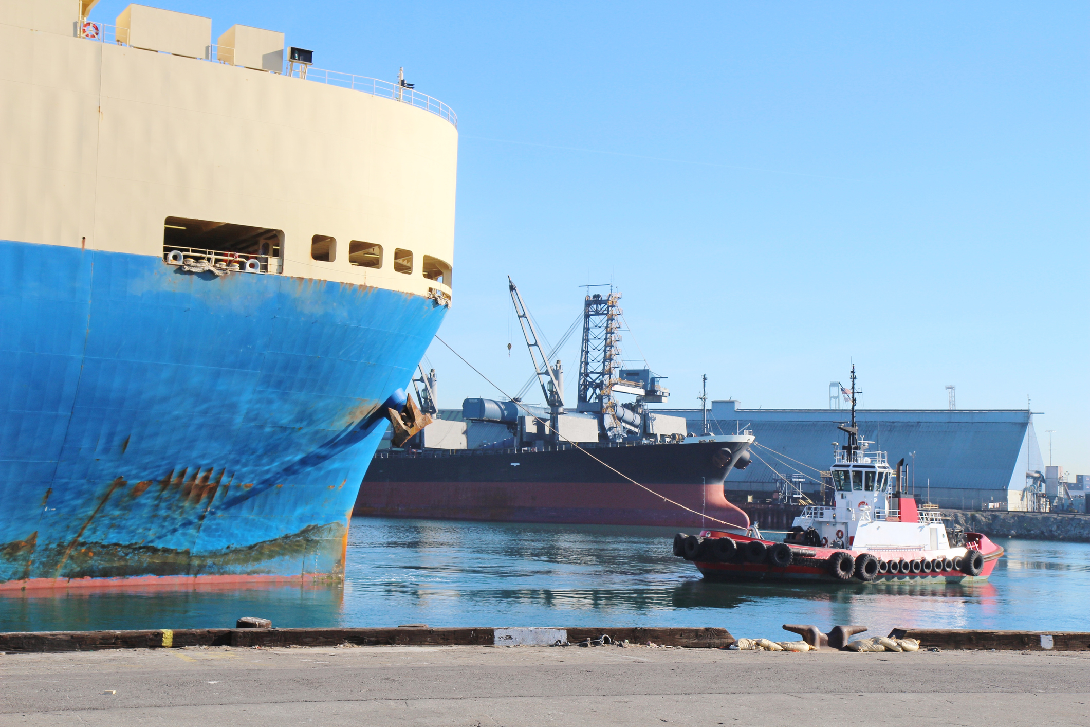 ship being towed into port