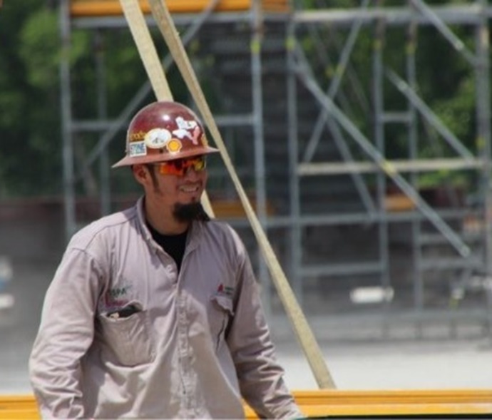 worker in hard hat on shipyard